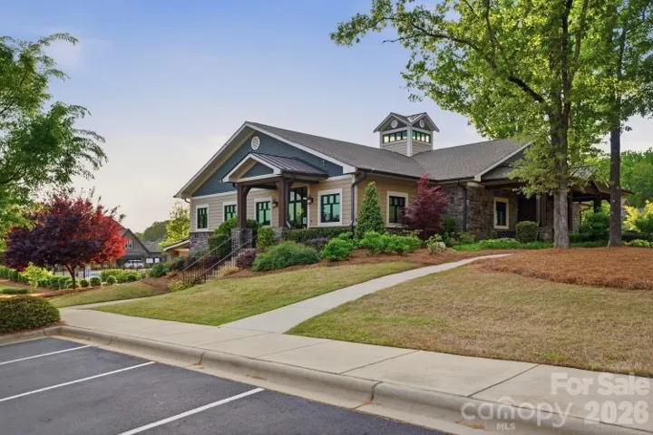 Community clubhouse with fitness center and pool