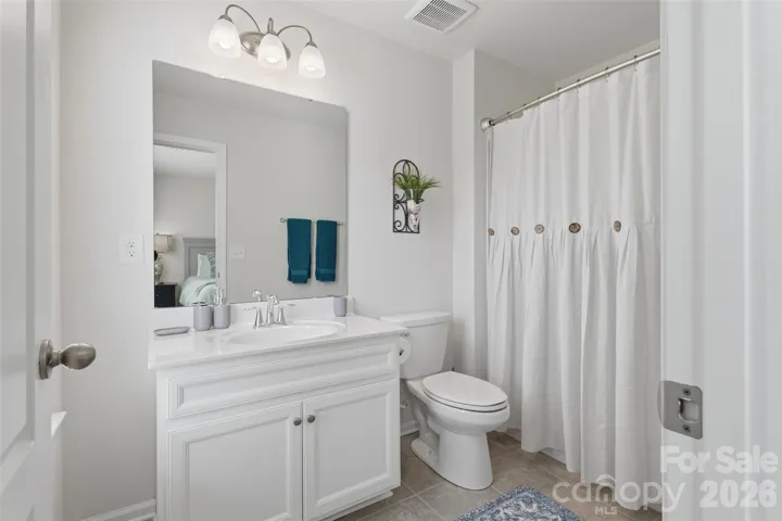 Private bathroom connected to fourth bedroom