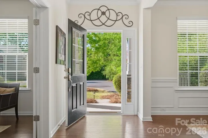 An open front door welcomes you inside