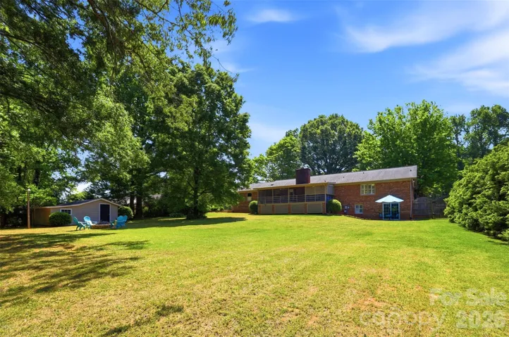 This rear yard is massive and could easily accommodate a pool
