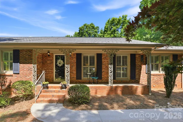 A perfect front porch to sip your sweet tea or coffee while surrounded with mature trees and bird song!
