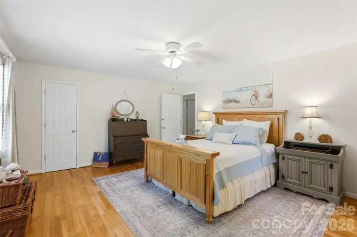 Primary bedroom has two closets for his and hers 
