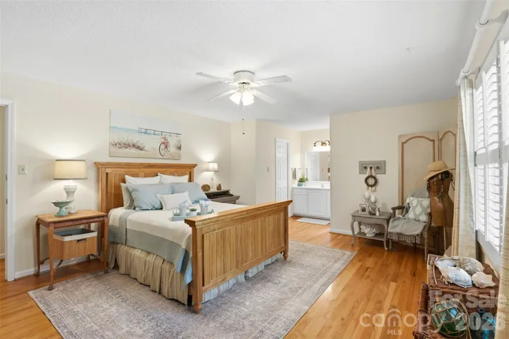 View of primary bedroom toward the bathroom