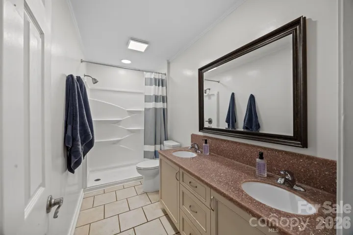 Full Bath just off primary bedroom. 
