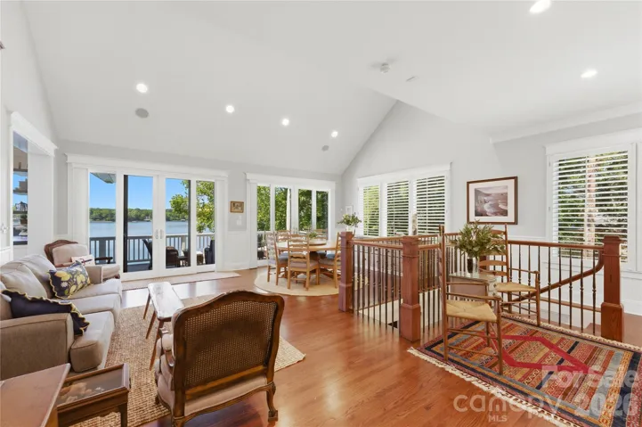 The living and dining areas with a wet bar provide the perfect setting for both intimate dinners and larger gatherings