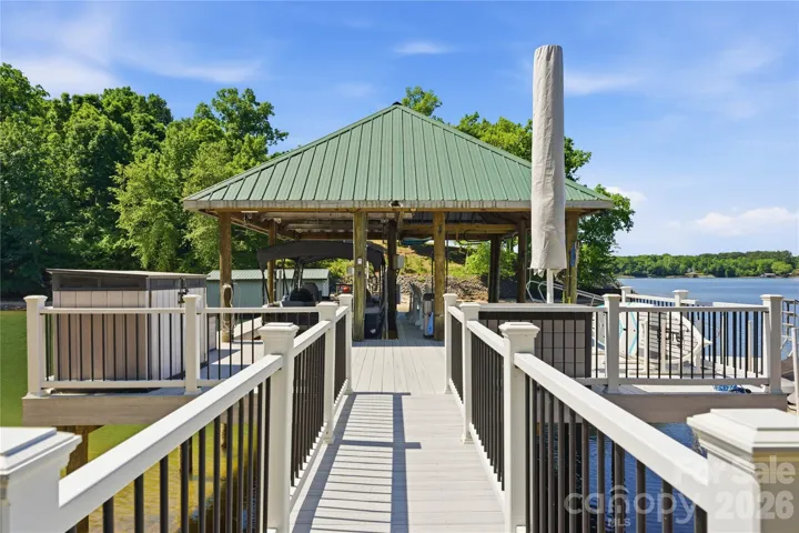 Composite covered dock with boat lift and floating dock