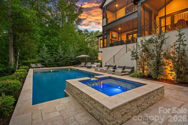 Saltwater pool & spa with travertine pool deck