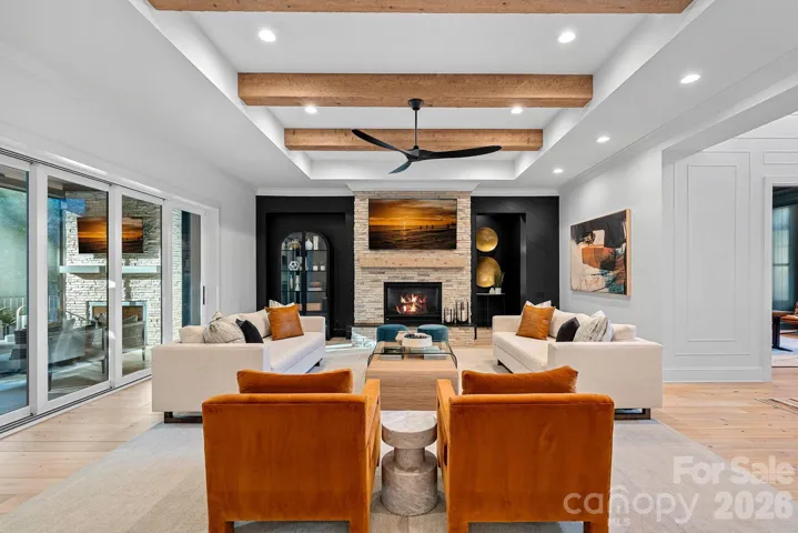 Great room features sliding glass pocket doors for seamless indoor/outdoor entertaining