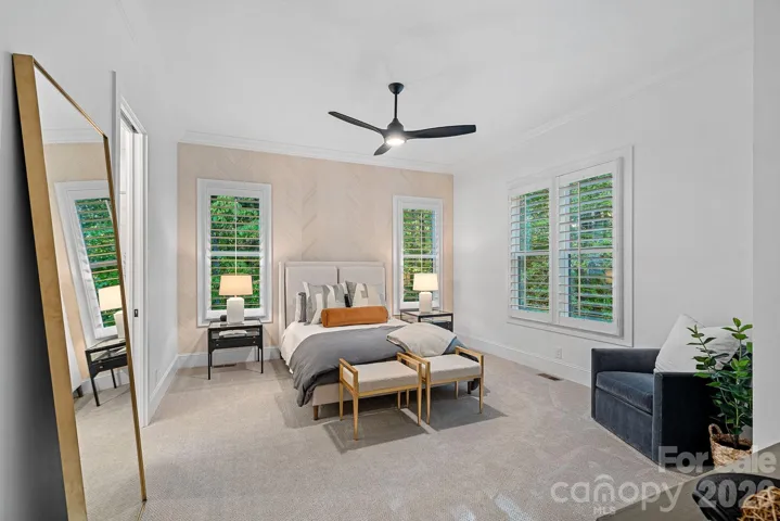 Main level guest ensuite with spacious walk-in closet.