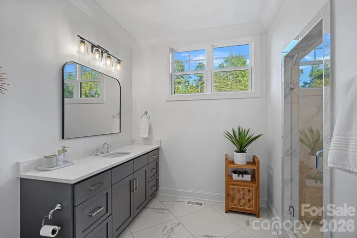 Ensuite bath #5 has spacious walk-in shower