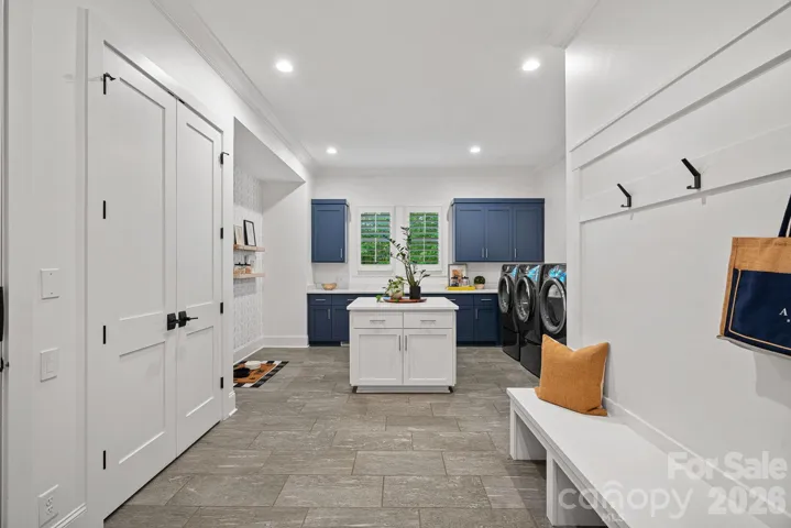Main level laundry & mudroom with drop zone