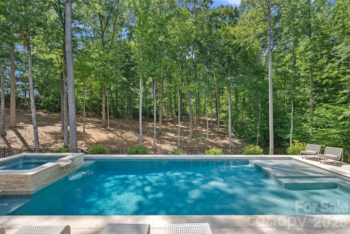 Amazing views in your spacious backyard. 1.8 acres is hard to find in River Run (and completely private!)