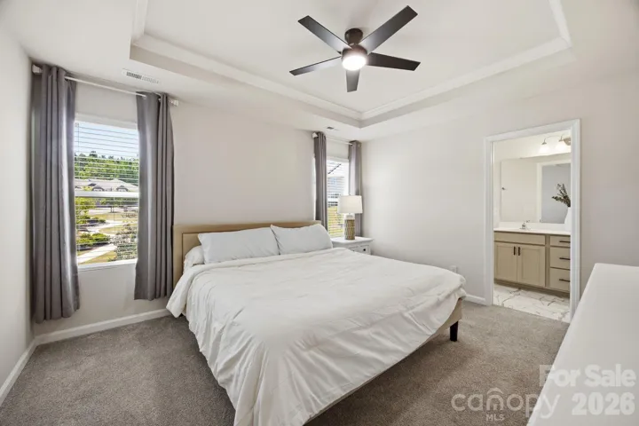 Gorgeous primary with tray ceiling
