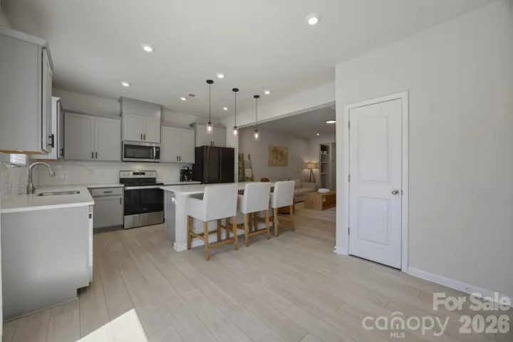 Dining area flows beautifully to the kitchen