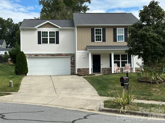Welcome to 1309 Red Birch Place, ideally situated on a quiet cul-de-sac with inviting curb appeal, a spacious front yard, and a charming rocking chair front porch—perfect for relaxing and enjoying the neighborhood.