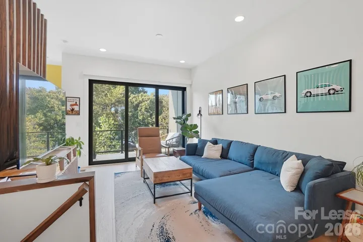 3 panel sliding glass doors lead to your private, covered balcony. 