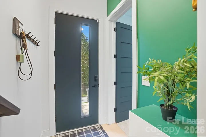 Welcome home: chic entry details and a smart-lock-ready front door. 