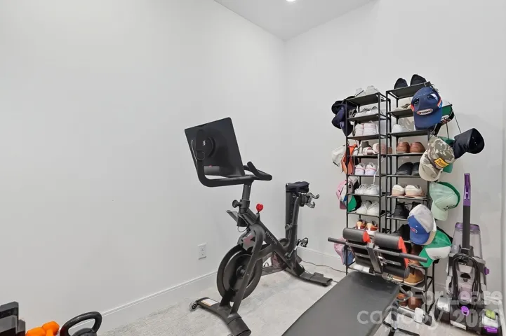 Versatile upper level flex space: ideally suited for a private home office, workout space, or nursery. 