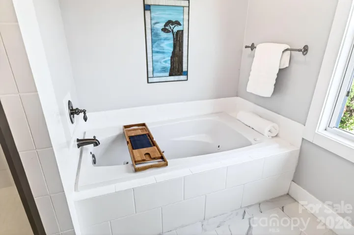 Primary bath soaking tub