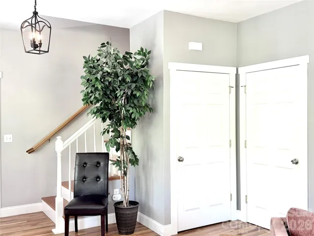 Coat closet and adjacent half bath