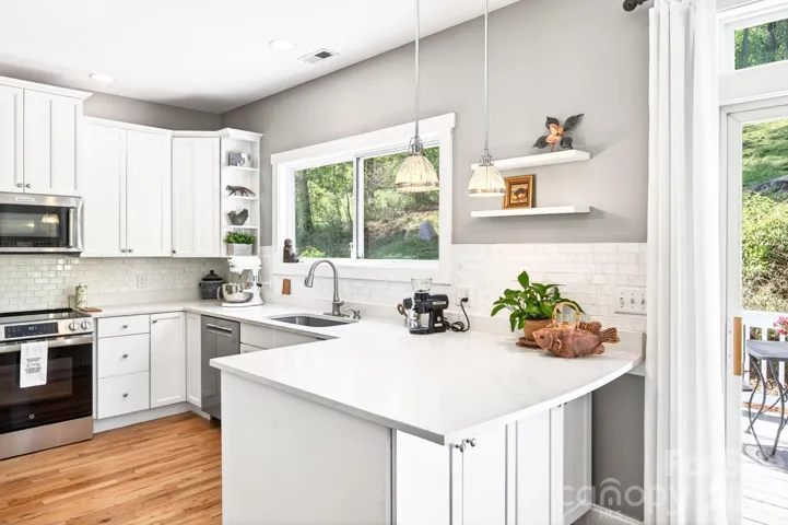White Cabinetry and Pendant Lights
