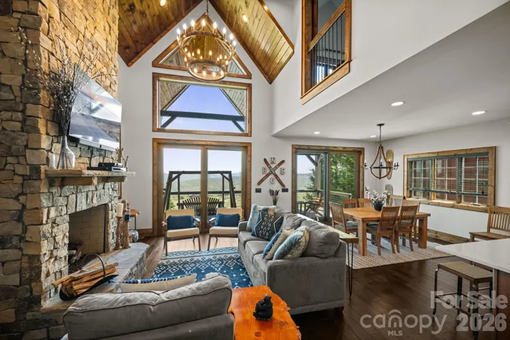 Living and dining flows seamlessly to the covered deck