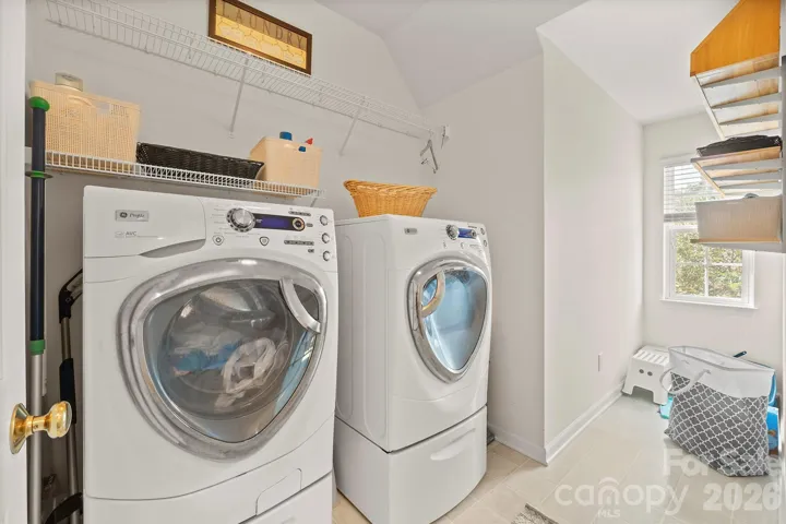 Laundry room conveniently located upstairs