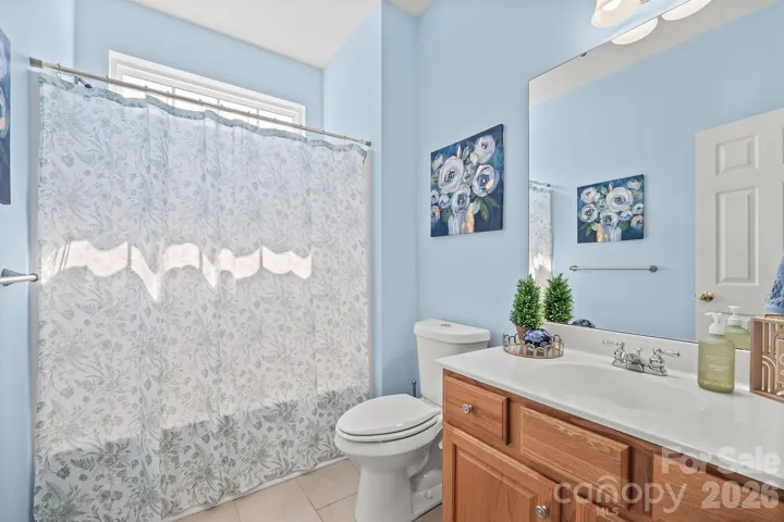 Full bathroom on main; easy access to flex room