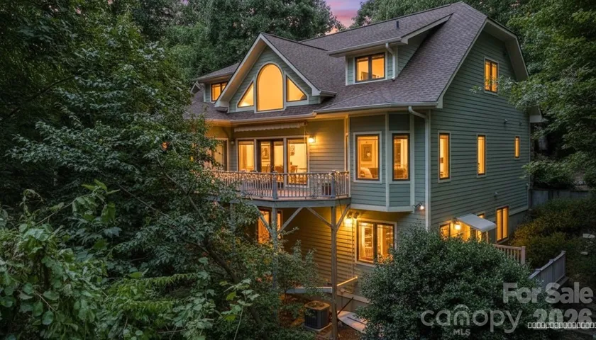 Welcome to 301 Gateway Drive! This three-bedroom, four-and a-half bath home offers privacy and only 5 miles to downtown Hendersonville.