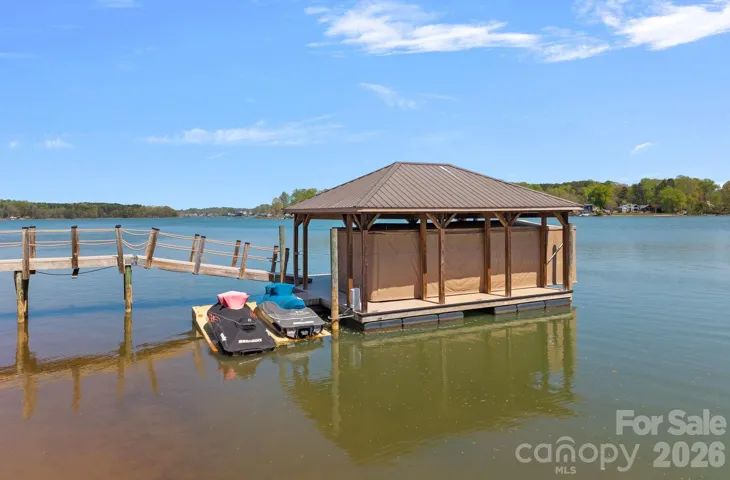 FLOATING COVERED DOCK WITH AUTOMATED BOAT COVER AND LIFT