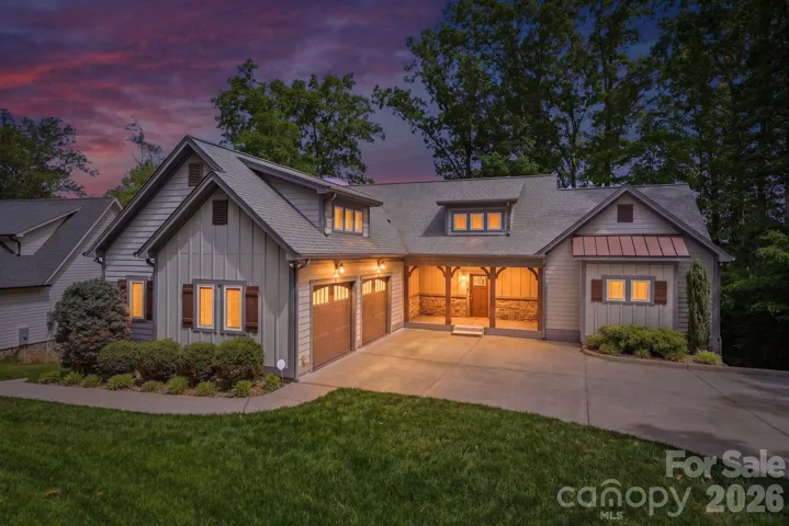 Beautifully maintained custom home on a private street just 2 miles from Lowe's corporate