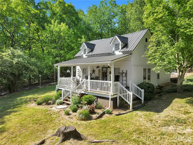 Fairy Tale Cottage in downtown Tryon, NC has over the top charm and has been beautifully restored. This is an extraordinary property!