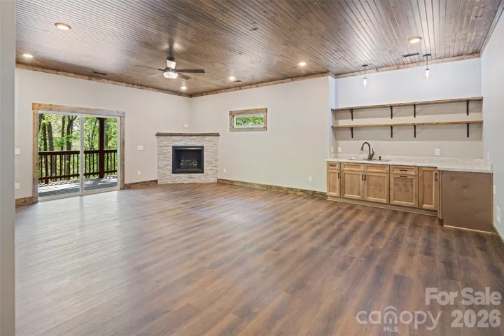 Lower Level - Den with Wet Bar & Gas Log Fireplace