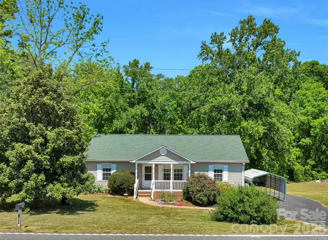 Absolutely turnkey 3 bedroom 2 bath home looks like a new build! Move right in to this home! Fenced back yard, 24'x30' detached garage, carport, generator, and newer roof.