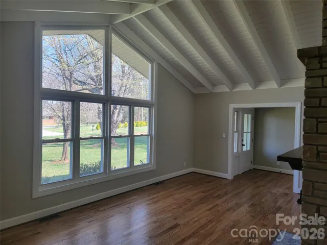 Living Room with true wood burning fireplace