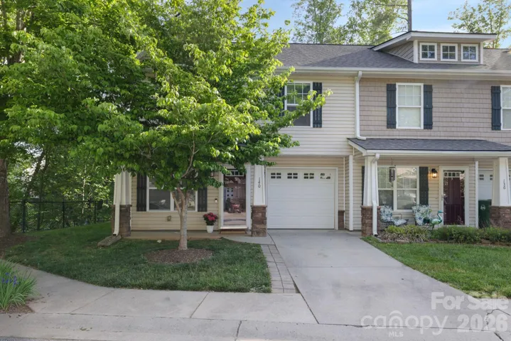 Welcome to 140 Thea Lane, an end unit town home in Fletcher.
