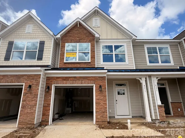Homesite 215 features an Ashland L Floorplan