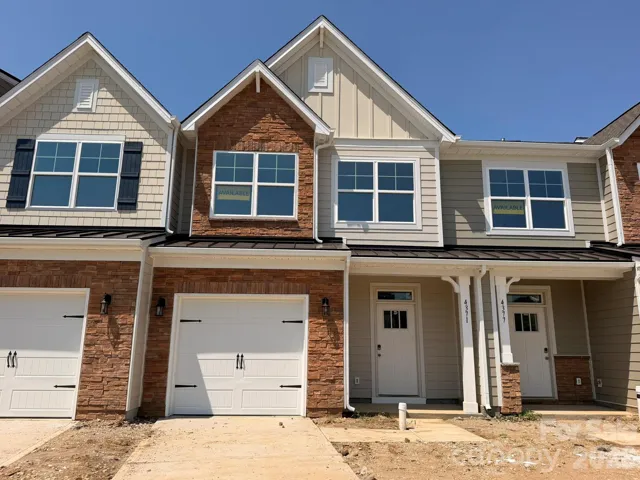 Homesite 215 features an Ashland L Floorplan
