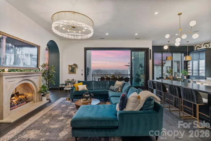 Spectacular sunsets nightly, over the treetops from this stunning double penthouse...