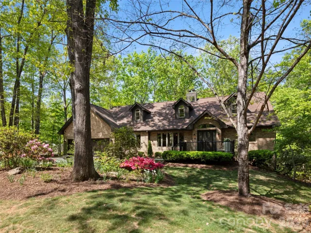 152 Eastmoor Drive is an example of quintessential Asheville thriving. Everything in this 3900 sq ft, 4 bed ensuite home has been touched, revisioned, removed, replaced.  Yet, the wooded tranquility and nostalgic spring blooms assure you that you are in the right place for life.