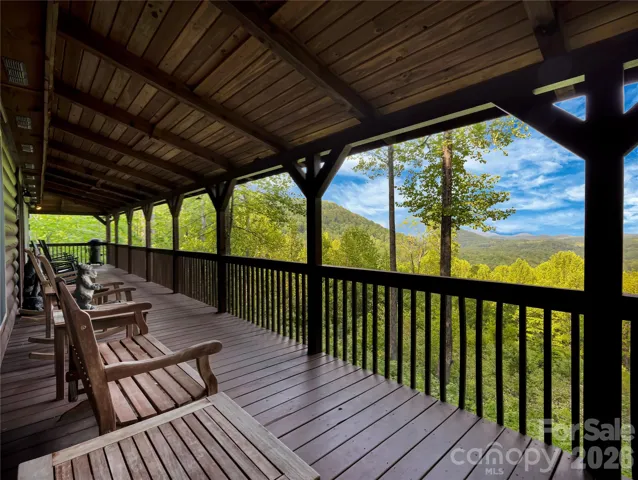Breathtaking long-range Blue Ridge mountain views from the wraparound porch