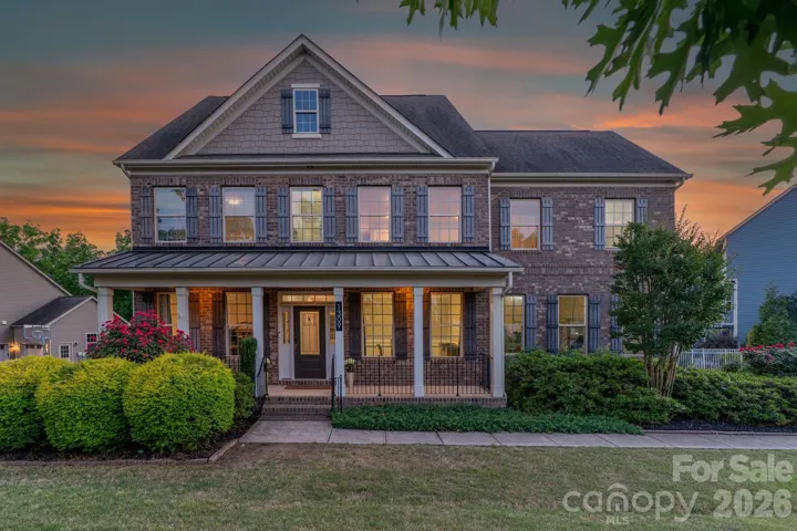 Welcome Home to 1309 Lightwood Road! 5 bed/5 bath w/ 3 car garage, pool, fire pit and 3 season room
