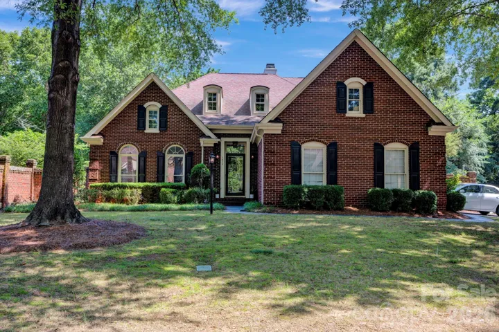 Welcome to 7014 Walton Heath Lane in Charlotte! This beautiful, Brick, 4-Bedroom home with the Primary on the Main, resides on a cul-de-sac within PullenGreen's gated community!