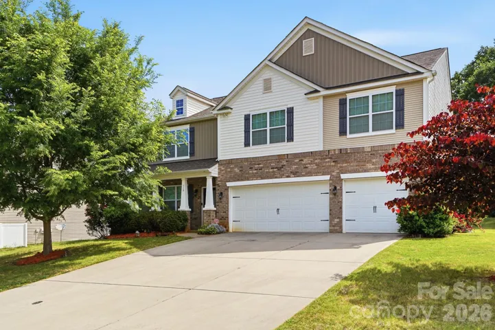 Front with a 3 car garage