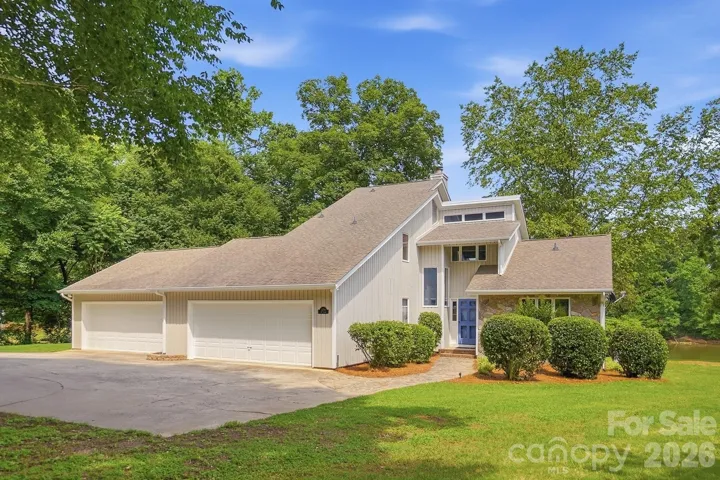 Beautiful 3 BR waterfront home on a level lot with stunning views of the lake