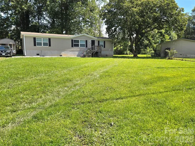 large flat lawn at front