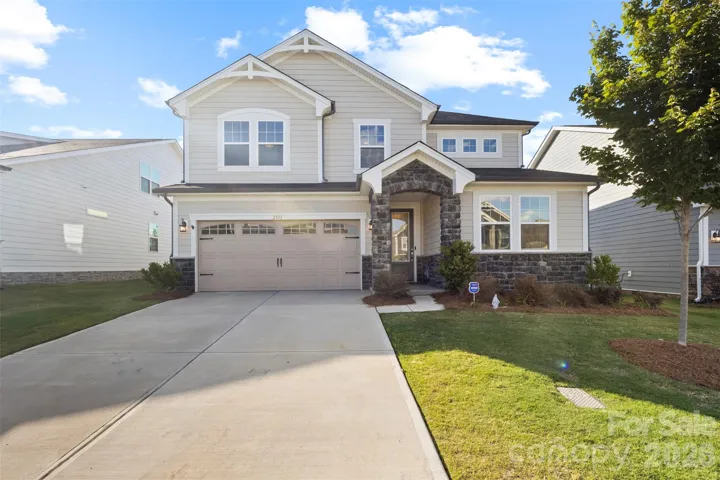 The front view of your new home. Landscaping on point!