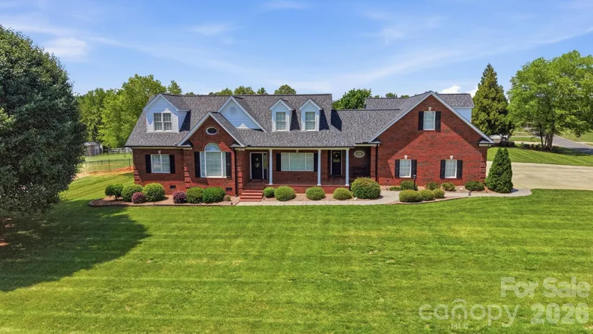 FULL BRICK HOME WITH NEW ROOF, GUTTERS, Vinyl Trim & Shutters May 2025