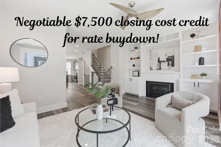 Welcome home to 2148 Electric Ln! Gather with guests in your bright living room with custom built-ins and fireplace!