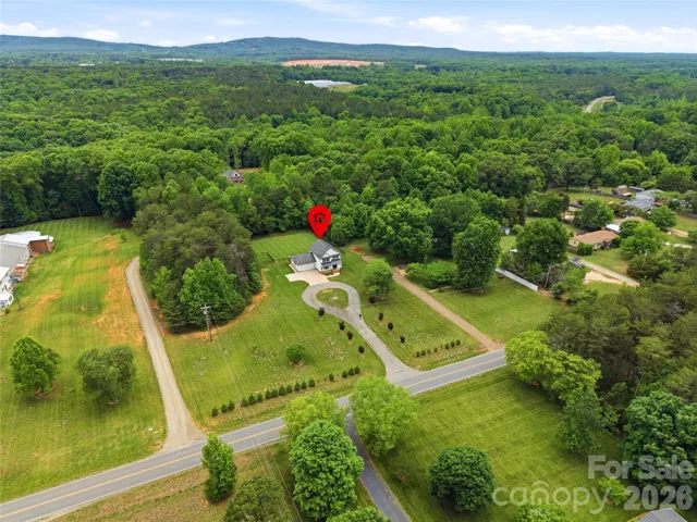 Charming home tucked off Grassy Creek Rd on almost 1 acre.